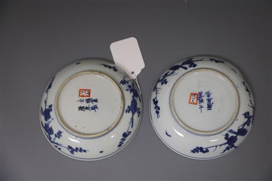 A pair of Chinese Ming blue and white phoenix saucer dishes, pseudo Wanli mark, 17th century, D. 13.5cm